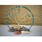 front view showing vignette background letting beautiful blue color hoop stand out standing amongst tumbled stones crescent moon accent 